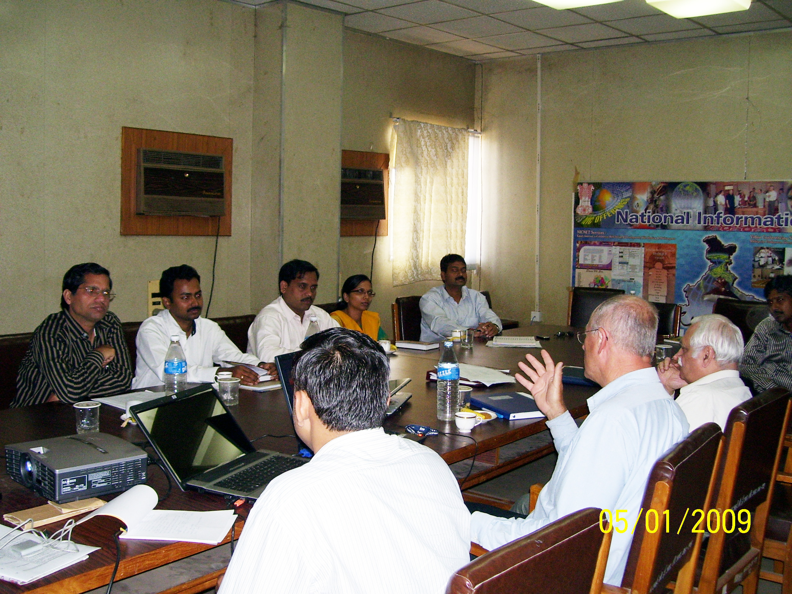 Team interacting during presentation session
