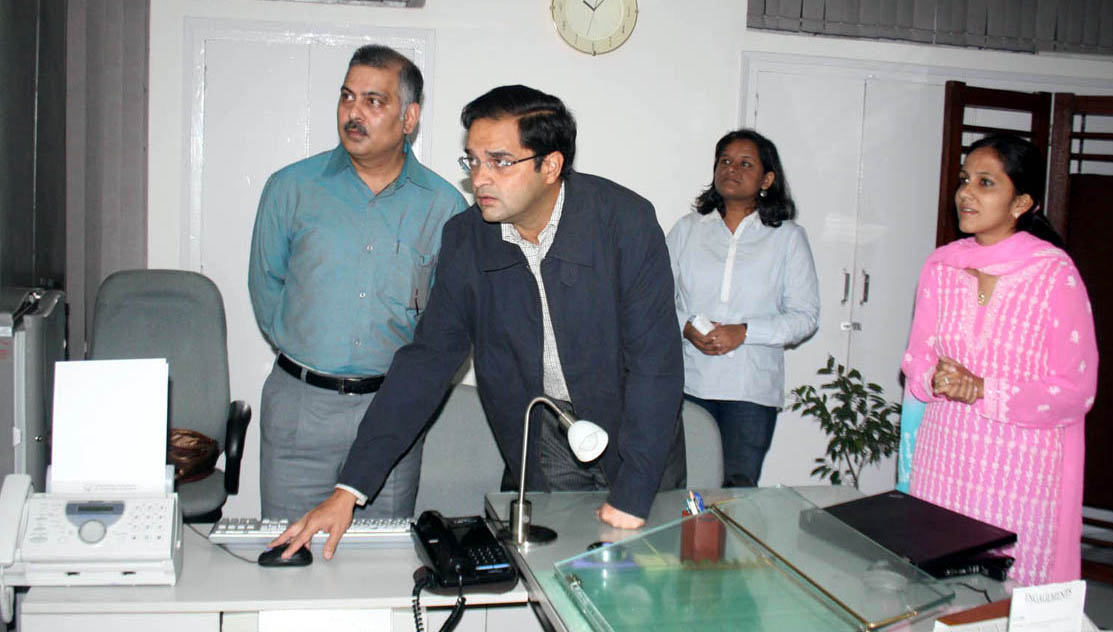 Mr. Brijendra Singh, DC launching the website