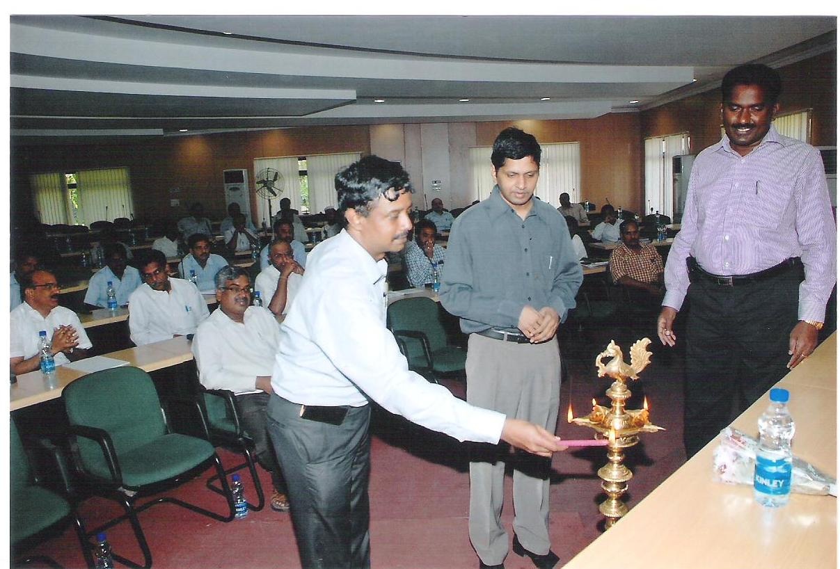 Sri K.S. Raghavan,  Sri. K. Bhasker, IAS,  Dr. Panduraga Rao   lighting the lamp