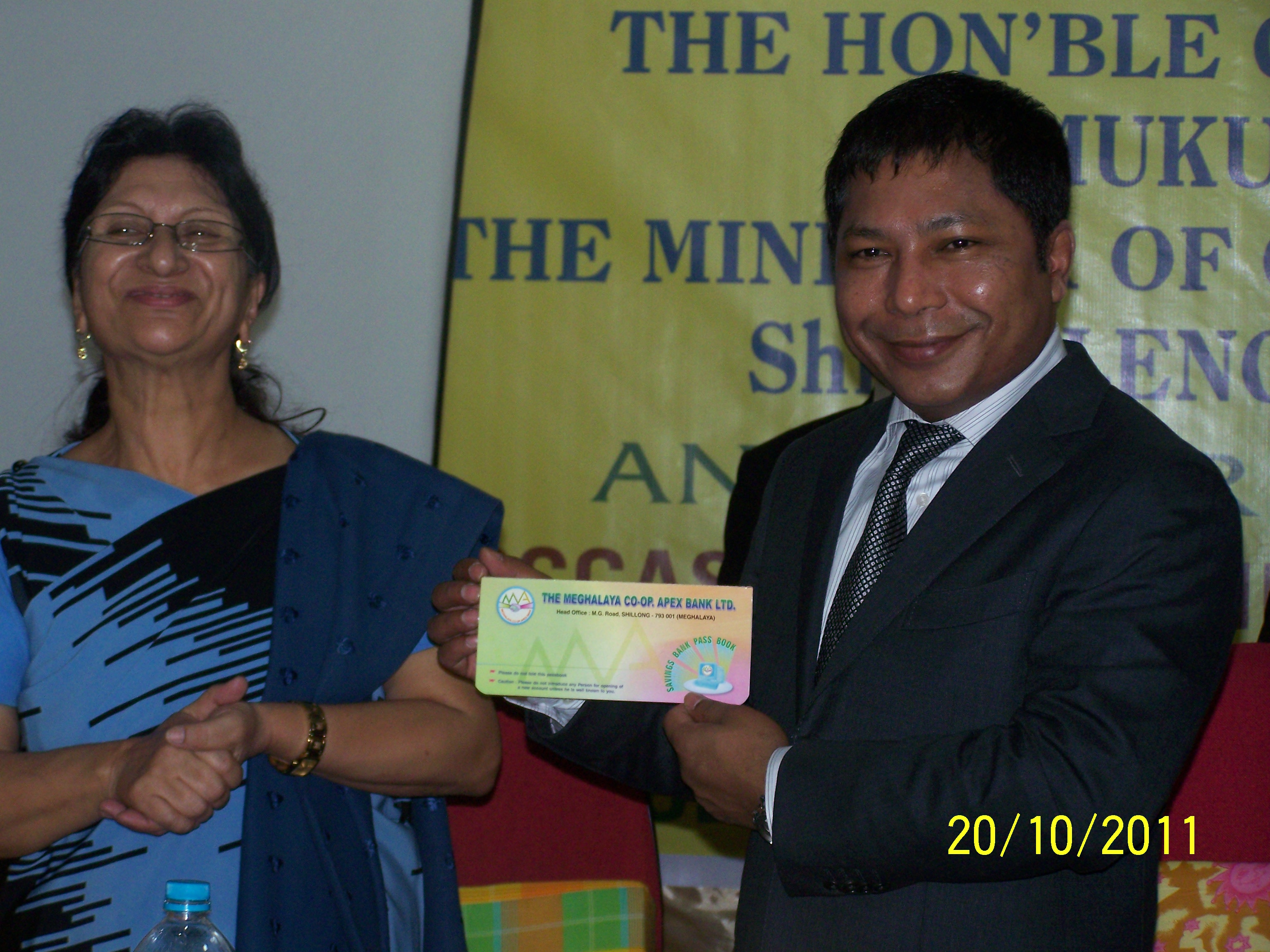 The Chief Minister being presented the first CCBS passbook
