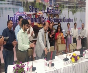 Accountant General, J&K inagurating the SMS facility and NIC Officer also present