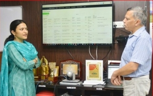 DIO Jammu Sanjay Gupta explaining the features of  Control Room Monitoring software to Deputy Commissioner Jammu Ms Sushma Chauhan