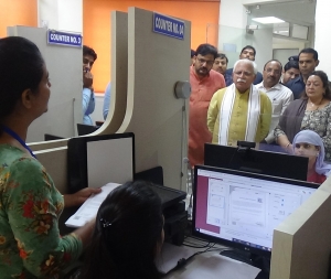 Honourable CM Haryana enquiring the process at counter