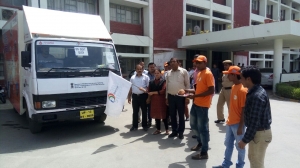Dy. Commissioner, Sirsa showing flag to start the special Van equipped with Audio - Video facilities
