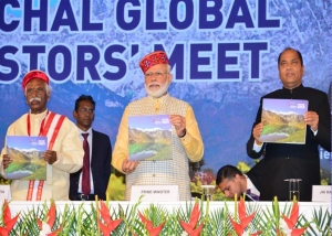 Sh. Narendra Modi, Honourable PM of India releasing the Coffee Table Book on Global Investor Meet, with Honourable Governor HP and Honourable CM HP