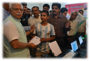 Honble CM distributing receipt of certificate to applicant