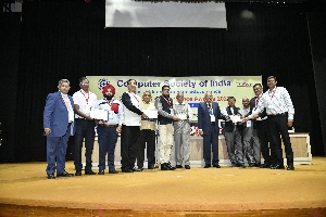 Sh. Deepak Bansal,SIO,NIC,Haryana, Sh. MP Kulshreshtha, Sr. Director IT,Sh. Pardeep Kumar Kaushal, Sr. Director IT and Sh. Amit Bansal receiving award