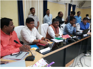 Honourable Minister addressing District Officials