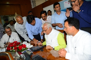 Honble Chief Minister Haryana Launching the Mobile App. Honble Revenue & Finance Minister and Chief Secretary Haryana also present.